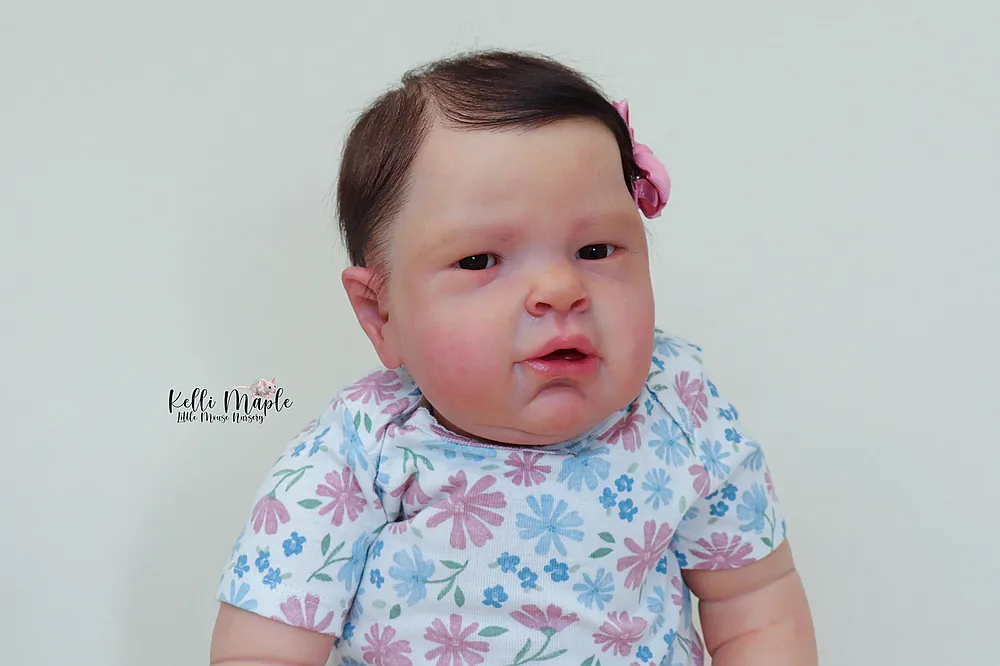 Asia older baby reborn doll sitting up pose photography