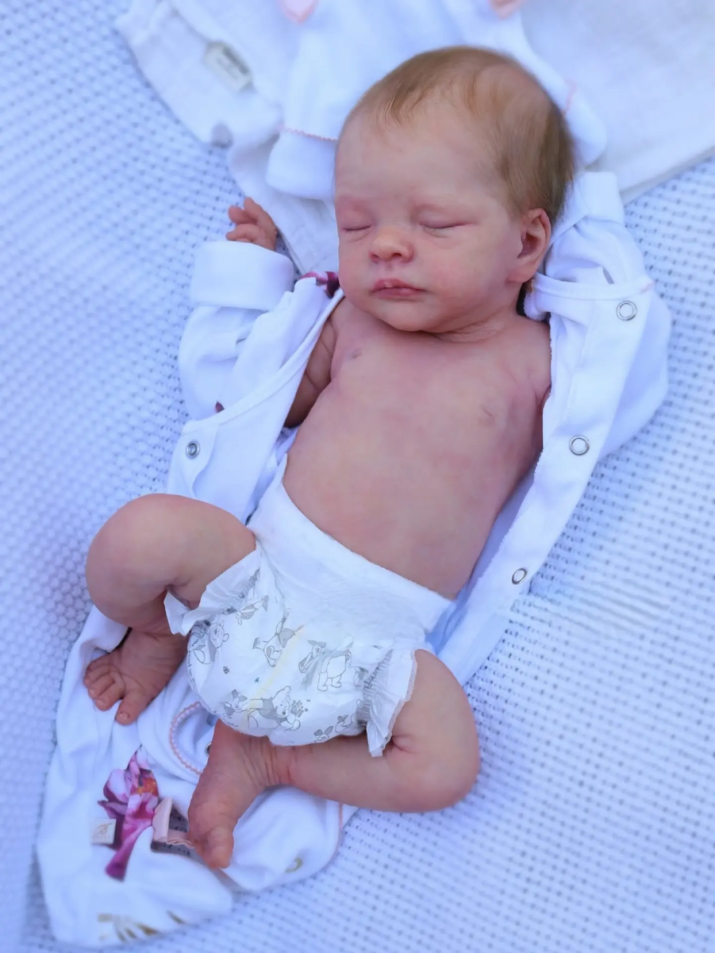 Kelli Maple reborn doll — silicone and vinyl handcrafted babies